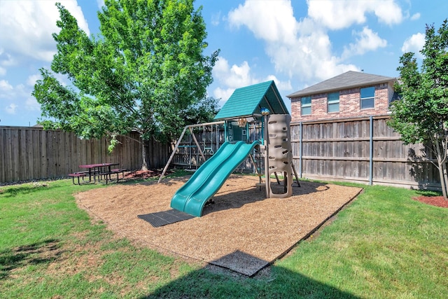 view of play area featuring a yard and a fenced backyard