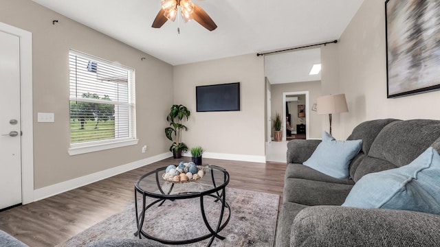 10018 Jackson Rd, Krum, TX 76249 - living room featuring baseboards, ceiling fan, and wood finished floors