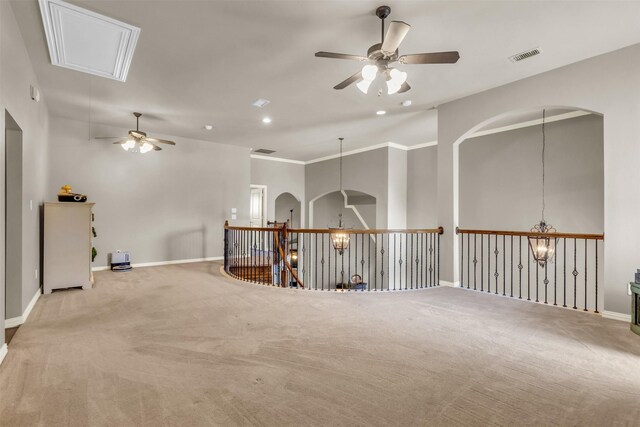 15604 Christopher Ln, Frisco, TX 75035 - carpeted spare room featuring a ceiling fan, attic access, baseboards, and arched walkways