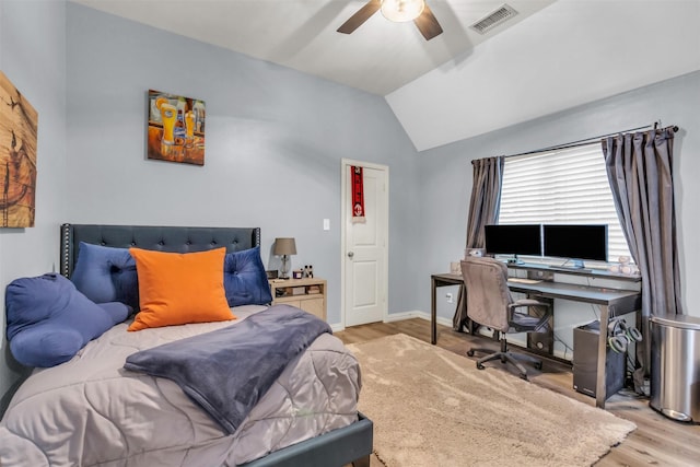 15604 Christopher Ln, Frisco, TX 75035 - bedroom with wood finished floors, lofted ceiling, a desk, a ceiling fan, and baseboards