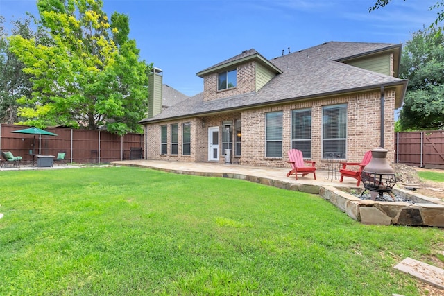 15604 Christopher Ln, Frisco, TX 75035 - rear view of property with an outdoor fire pit, a shingled roof, and a patio area