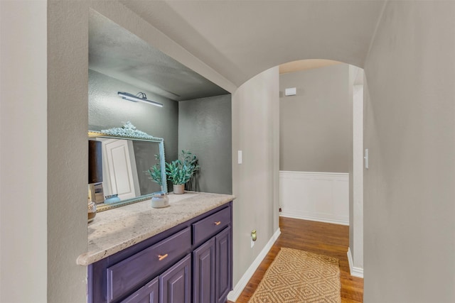 15604 Christopher Ln, Frisco, TX 75035 - bathroom with wood finished floors, vanity, and baseboards