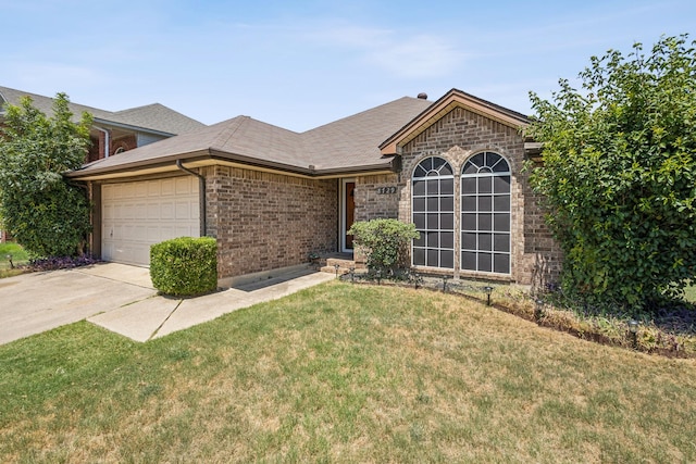 ranch-style home featuring an attached garage, a front lawn, brick siding, and concrete driveway