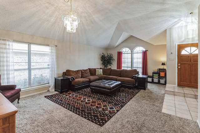 carpeted living area with plenty of natural light, lofted ceiling, tile patterned floors, and a chandelier