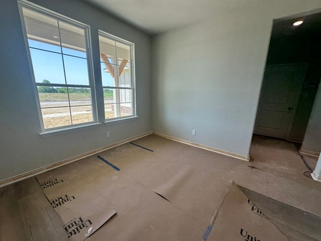 2471 Blackjack Oak Rd, Oak Ridge, TX 75161 - spare room featuring baseboards