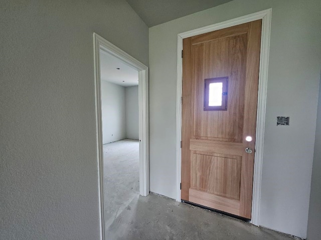 interior space featuring concrete flooring