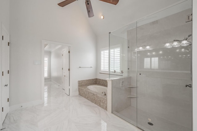 full bath with a ceiling fan, a stall shower, a bath, baseboards, and high vaulted ceiling