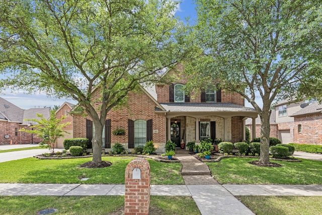 7913 Craftsbury Ln, Mckinney, TX 75071 - traditional-style home featuring a front yard, brick siding, and covered porch
