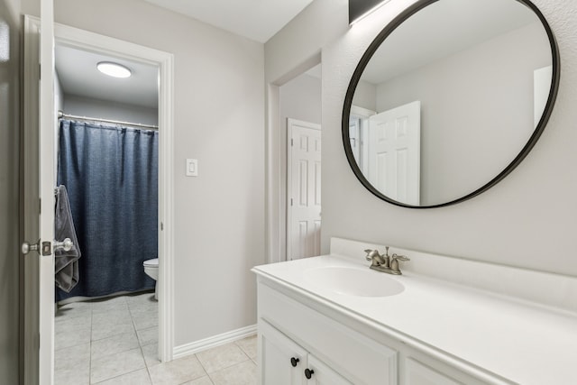 7913 Craftsbury Ln, Mckinney, TX 75071 - full bath featuring tile patterned floors, vanity, toilet, and baseboards