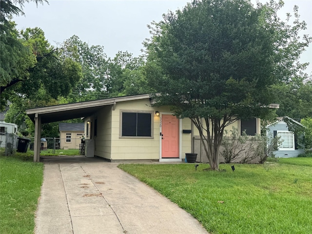 5520 Birchman Ave, Fort Worth, TX 76107 - view of front of home featuring driveway, a front lawn, and a carport