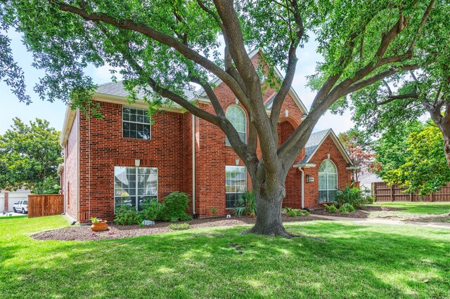 3609 Dandelion Dr, Plano, TX 75093 - traditional home featuring brick siding