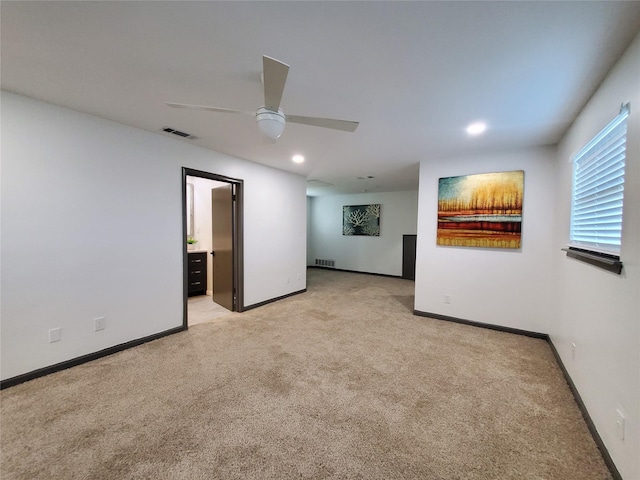 unfurnished room featuring visible vents, a ceiling fan, recessed lighting, and light colored carpet