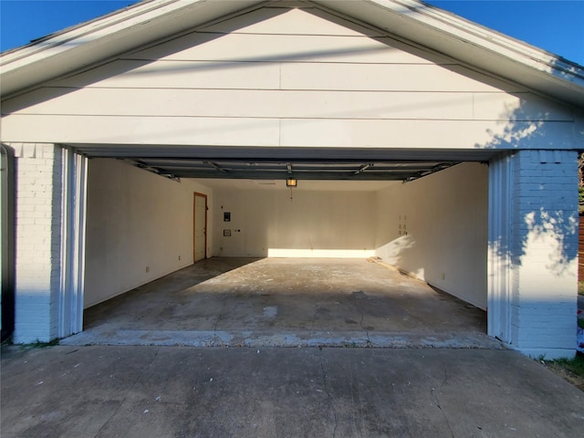 garage featuring driveway