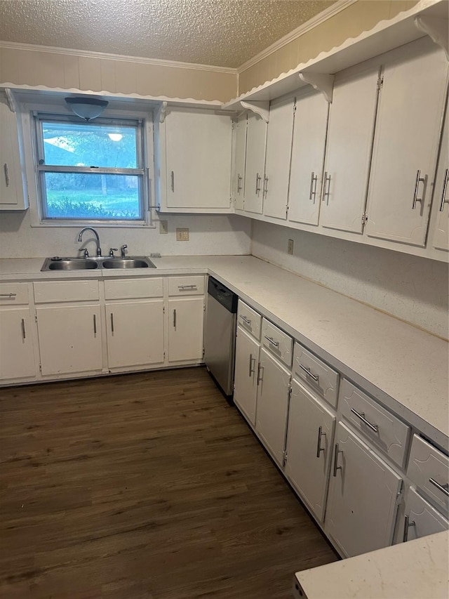 202 S Spencer St, Mart, TX 76664 - kitchen with crown molding, a textured ceiling, a sink, dark wood finished floors, and dishwasher