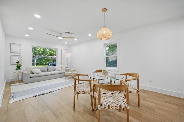 dining space with visible vents, baseboards, ceiling fan, recessed lighting, and light wood-style flooring