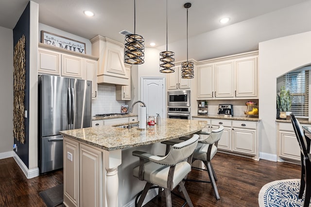 1617 Mack Ln, Little Elm, TX 75068 - kitchen featuring appliances with stainless steel finishes, dark wood-style floors, a sink, decorative backsplash, and recessed lighting