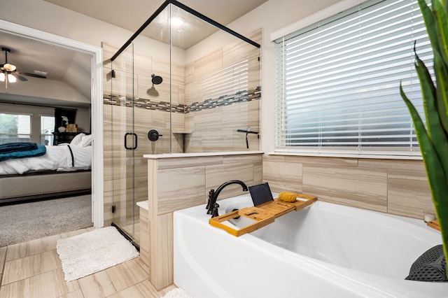 1617 Mack Ln, Little Elm, TX 75068 - full bath featuring ensuite bathroom, a shower stall, a ceiling fan, and a garden tub