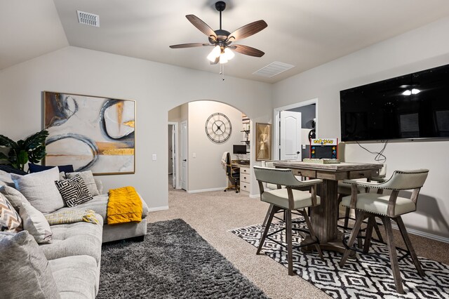 1617 Mack Ln, Little Elm, TX 75068 - carpeted living area with arched walkways, baseboards, ceiling fan, lofted ceiling, and an office area