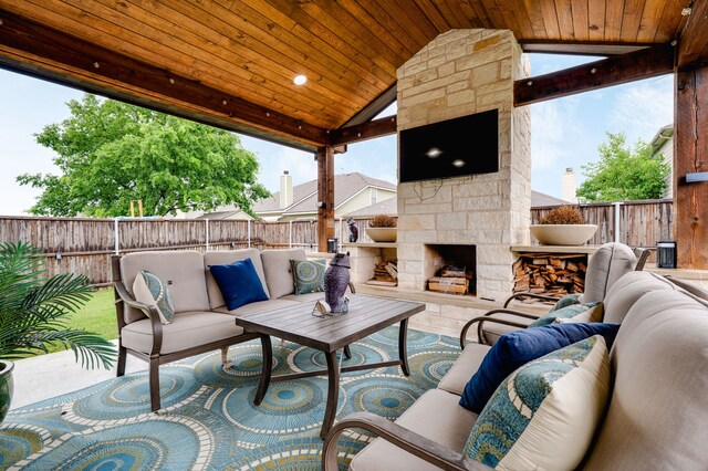 1617 Mack Ln, Little Elm, TX 75068 - view of patio featuring an outdoor living space with a fireplace and a fenced backyard