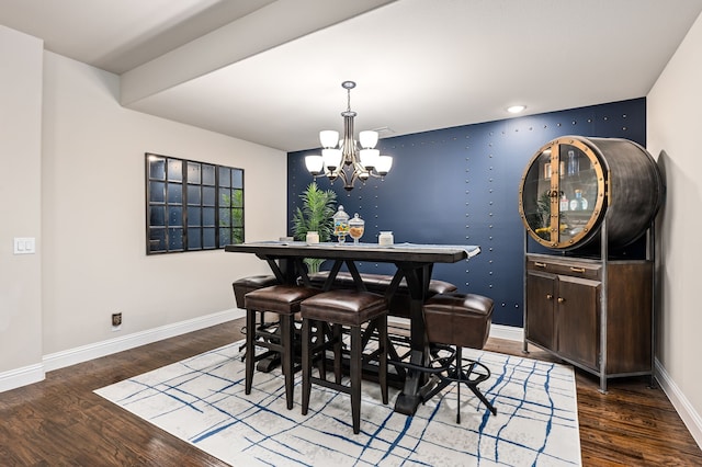1617 Mack Ln, Little Elm, TX 75068 - dining room with a chandelier, wood finished floors, and baseboards
