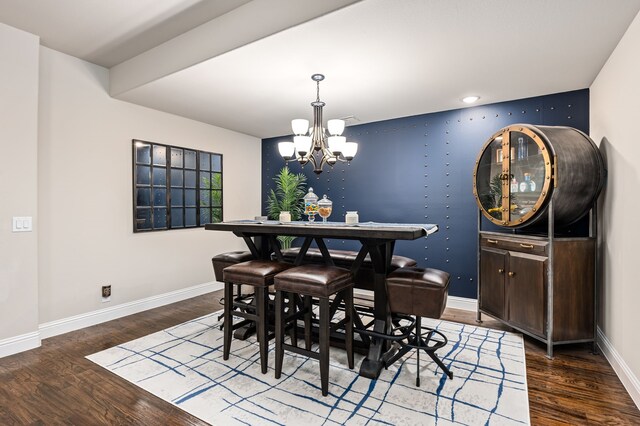 1617 Mack Ln, Little Elm, TX 75068 - dining room with a chandelier, wood finished floors, and baseboards