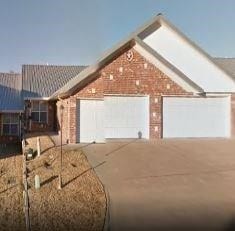 1813 Riverstone Ln, Longview, TX 75605 - view of front of home with an attached garage and driveway