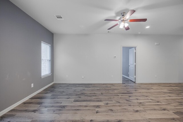 2801 17th St, Fort Worth, TX 76106 - unfurnished room featuring baseboards, ceiling fan, visible vents, and wood finished floors