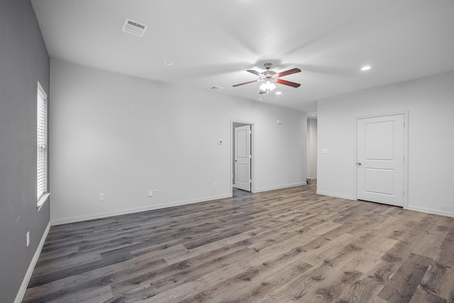 2801 17th St, Fort Worth, TX 76106 - spare room featuring visible vents, a ceiling fan, baseboards, and wood finished floors