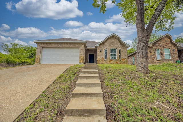 2801 17th St, Fort Worth, TX 76106 - ranch-style house featuring brick siding, driveway, and a garage