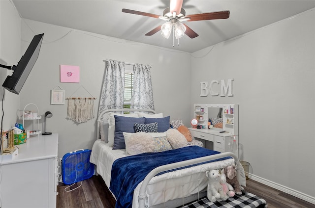 141 Walnut St, Paradise, TX 76073 - bedroom with dark wood finished floors, ceiling fan, and baseboards