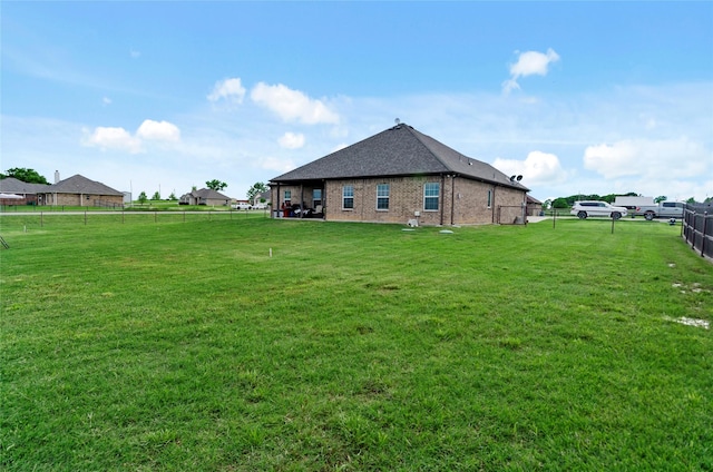 141 Walnut St, Paradise, TX 76073 - back of property with brick siding and roof with shingles