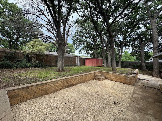 1038 Oak Hurst Dr, Grapevine, TX 76051 - fenced backyard featuring a storage unit, an outdoor structure, and a patio area