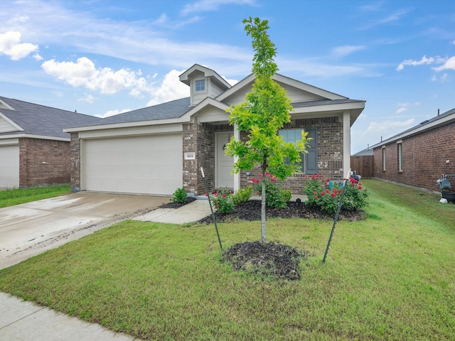view of front facade featuring a garage, concrete driveway, a front yard, and brick siding