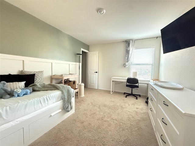 bedroom with light carpet