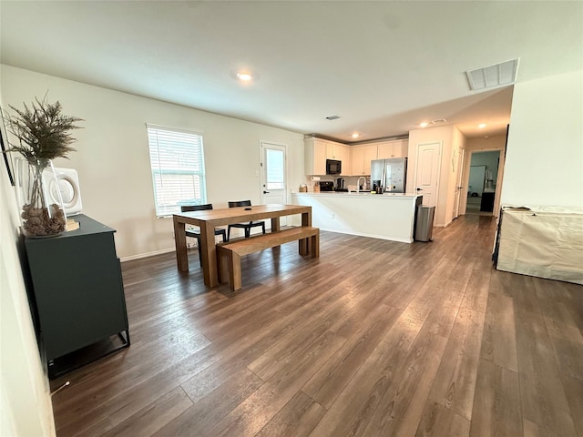 dining room with visible vents, recessed lighting, baseboards, and dark wood-style floors