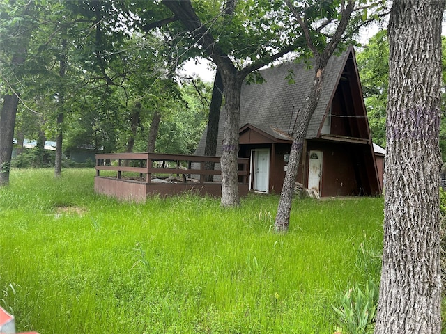 207 Woody Dr, Mabank, TX 75156 - exterior space with a shingled roof
