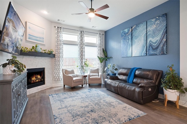 1500 Ranger Rd, Aubrey, TX 76227 - living room featuring ceiling fan, wood finished floors, and a fireplace
