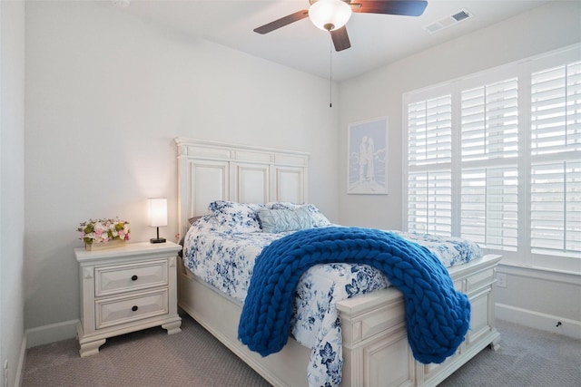 1500 Ranger Rd, Aubrey, TX 76227 - carpeted bedroom with multiple windows, baseboards, and a ceiling fan
