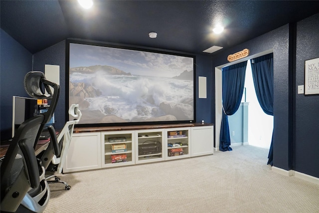 1500 Ranger Rd, Aubrey, TX 76227 - home theater room featuring carpet, vaulted ceiling, and baseboards