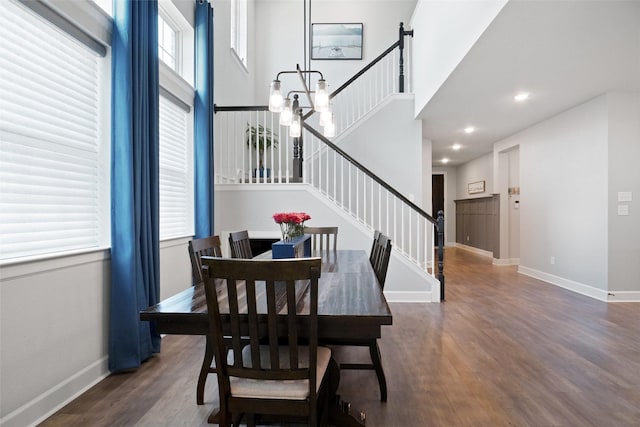 1500 Ranger Rd, Aubrey, TX 76227 - dining space with stairs, wood finished floors, healthy amount of natural light, baseboards, and a high ceiling