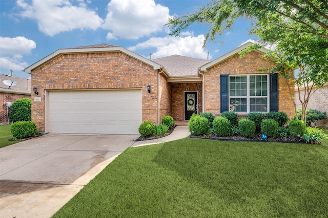 1130 Pasatiempo Dr, Frisco, TX 75036 - view of front of home featuring brick siding, driveway, a front yard, an attached garage, and roof with shingles