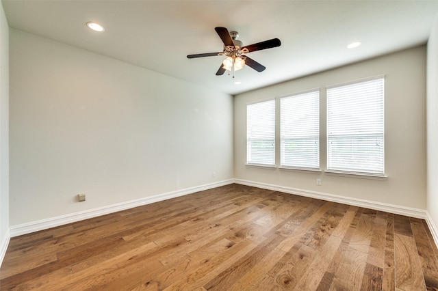 1130 Pasatiempo Dr, Frisco, TX 75036 - spare room featuring wood finished floors, ceiling fan, baseboards, and recessed lighting