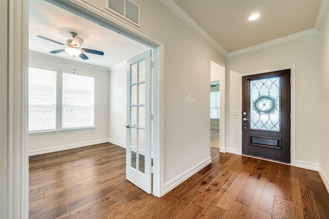 1130 Pasatiempo Dr, Frisco, TX 75036 - entrance foyer with hardwood / wood-style flooring, ornamental molding, plenty of natural light, baseboards, and recessed lighting