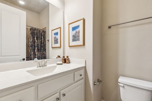 5924 Heron Bay Ln, Mckinney, TX 75070 - bathroom featuring vanity, toilet, and a shower with shower curtain