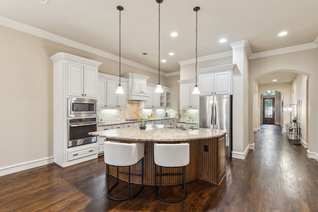 5924 Heron Bay Ln, Mckinney, TX 75070 - kitchen featuring appliances with stainless steel finishes, a sink, dark wood-style flooring, backsplash, and crown molding