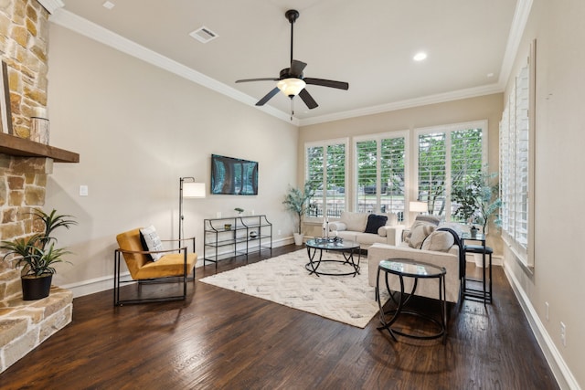 5924 Heron Bay Ln, Mckinney, TX 75070 - living room with dark wood-type flooring, healthy amount of natural light, a ceiling fan, ornamental molding, and recessed lighting