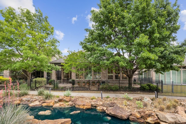 5924 Heron Bay Ln, Mckinney, TX 75070 - back of house featuring brick siding