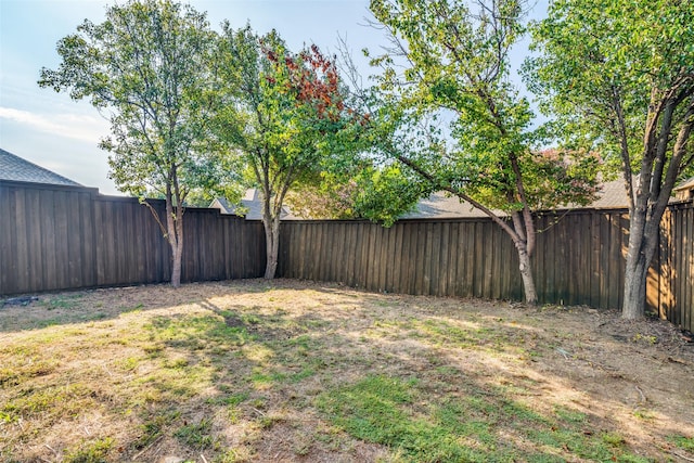 view of yard featuring a fenced backyard
