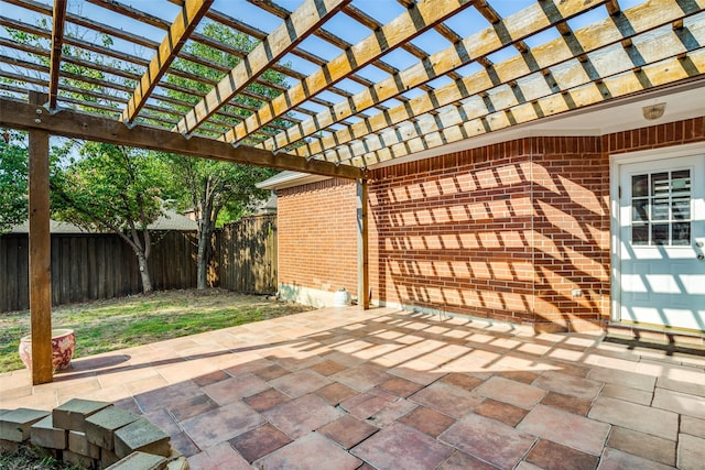 view of patio with a fenced backyard and a pergola