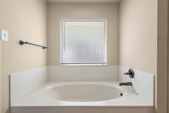 full bath featuring a bath